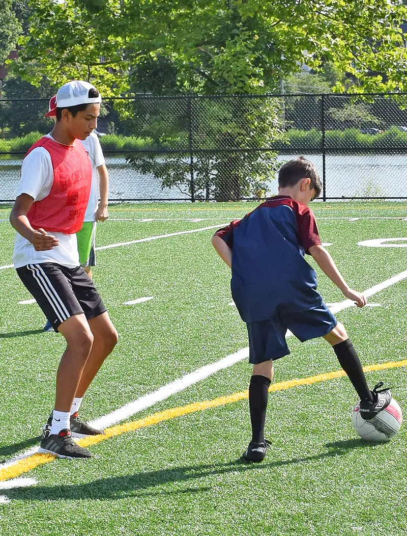 mvp basketball camp schedule - boy spinning basketball